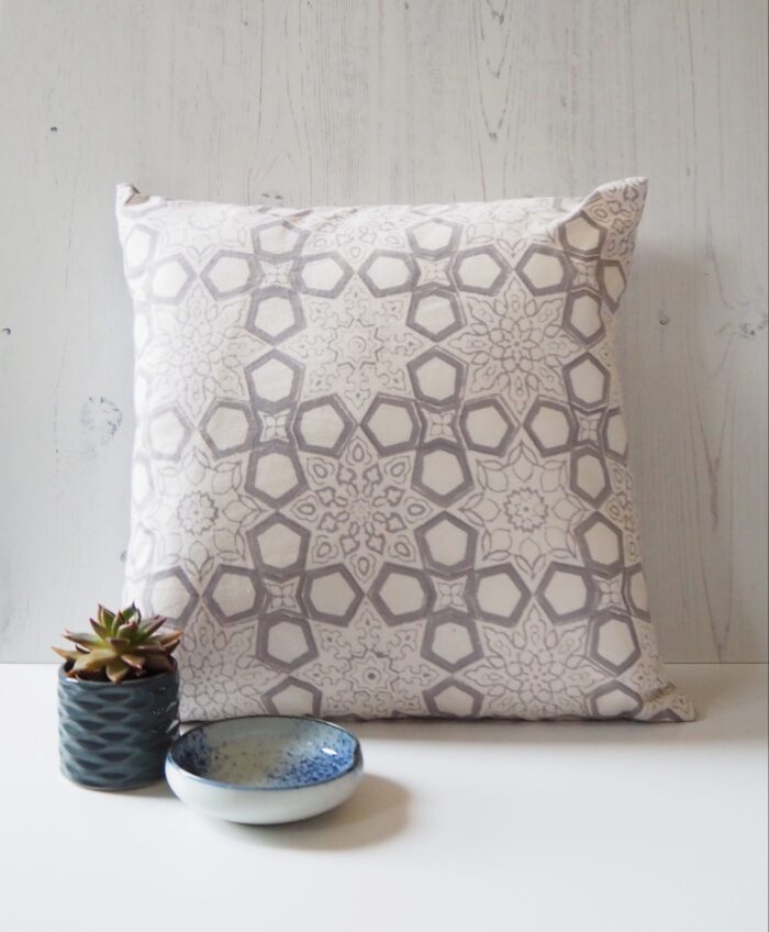 block print patterned cushion