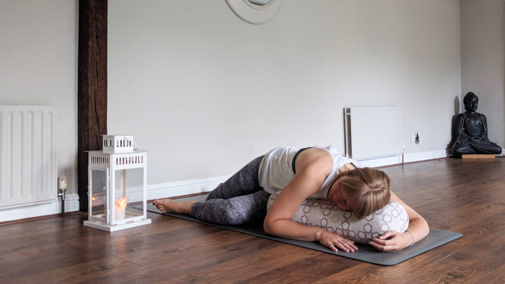 reclined twist yoga pose