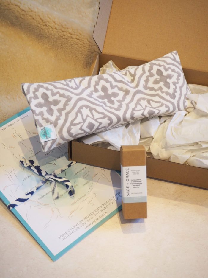 Yogipod relaxation bundle featuring a block printed eye pillow and aromatherapy roller