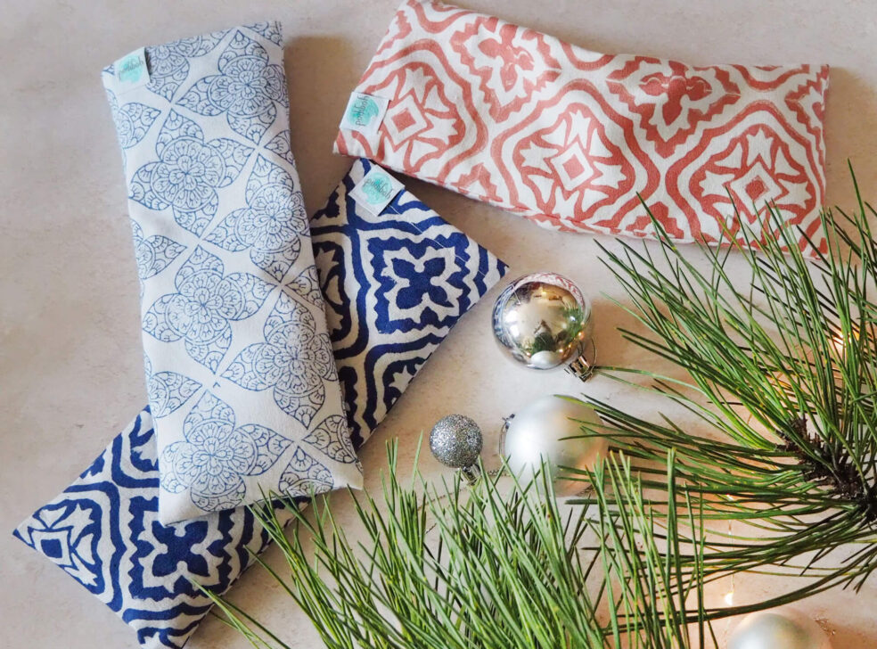 Yogipod hand printed eye pillows nestled amongst fir and baubles