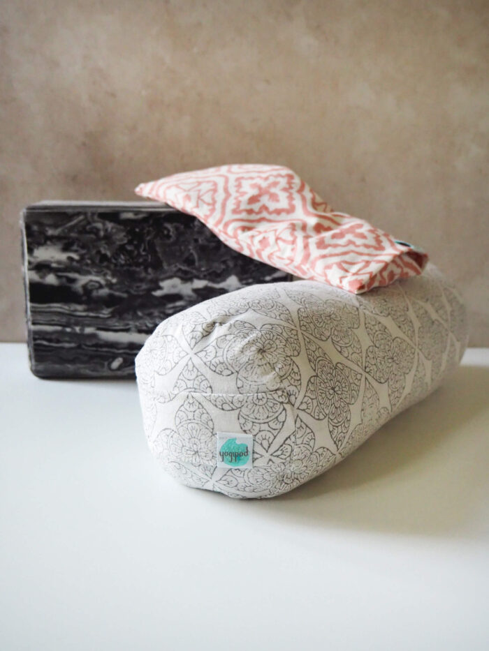 Hand block printed Yogipod mini bolster in filigree flower design in grey