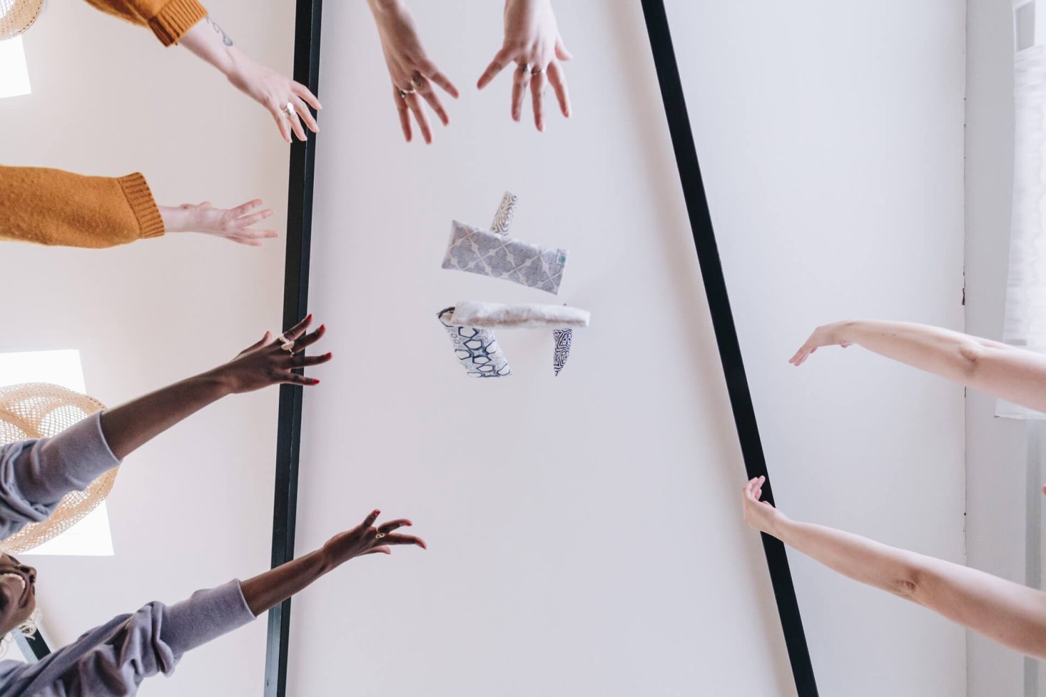 Yogipod eye pillows thrown in the air