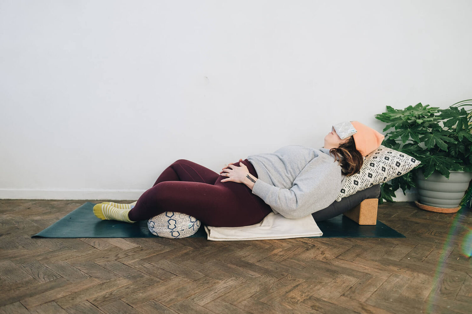 Harriet McAtee rests in supta baddha konasana