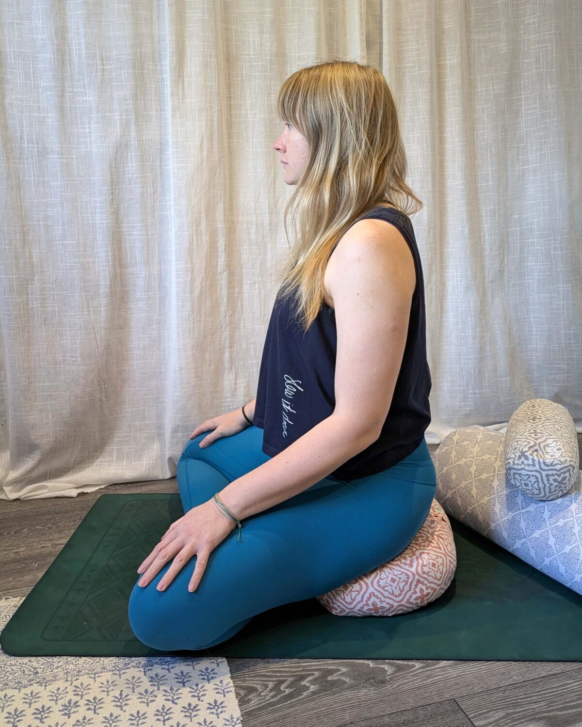 sitting comfortably on a meditation cushion