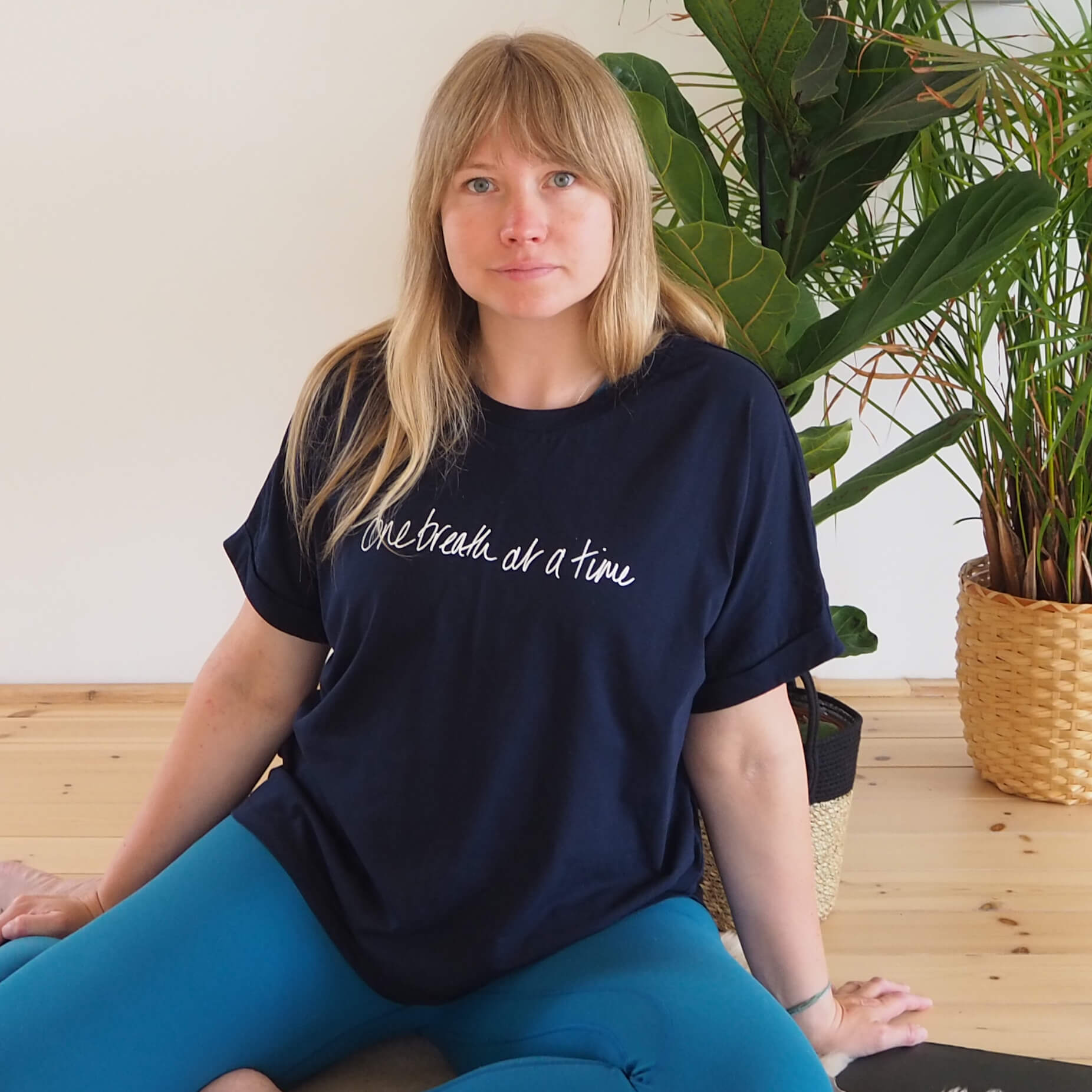 Yogipod founder Georgie wears the One Breath Tee
