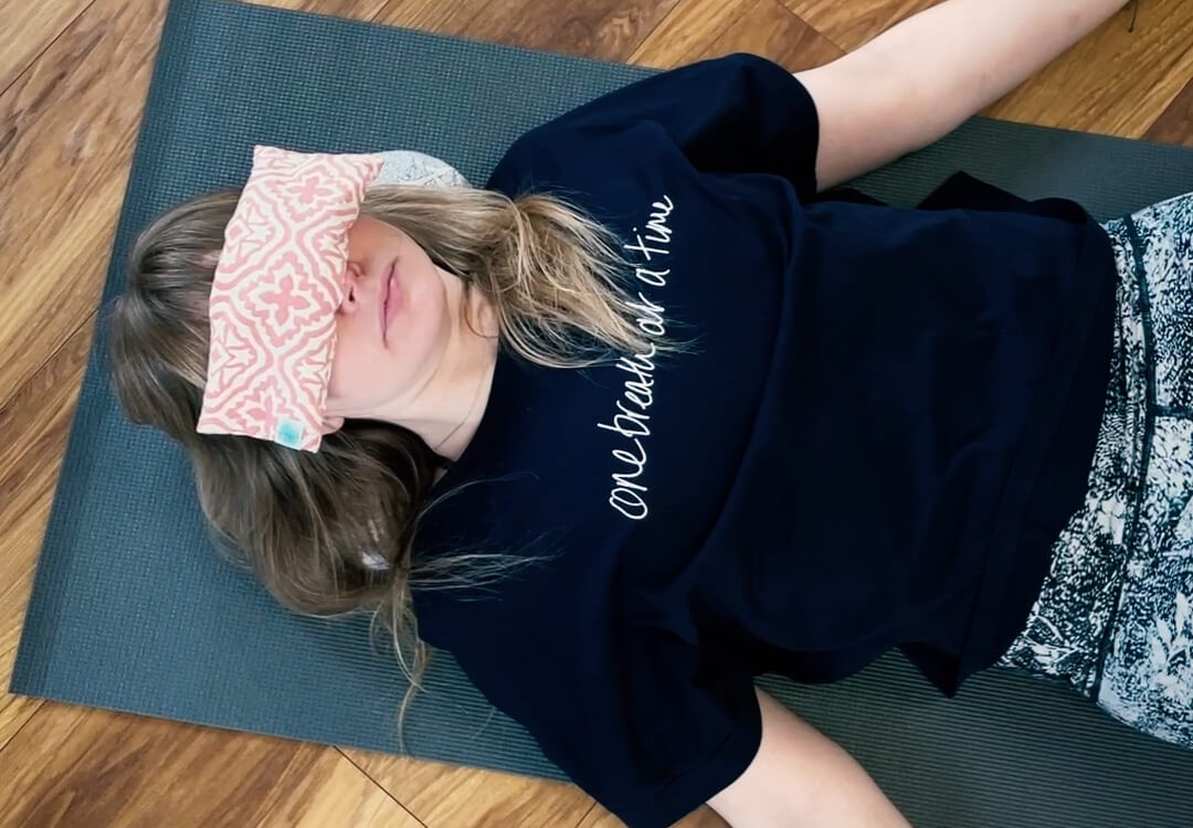 Georgie wears the One breath yoga t shirt